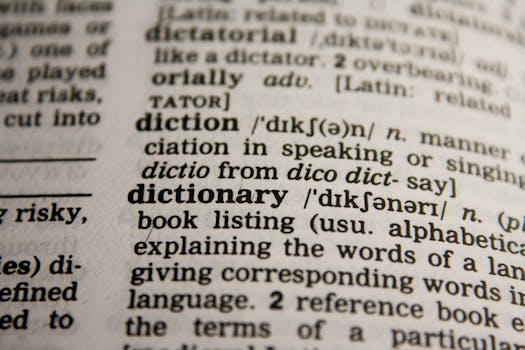 pexels-photo-267669-267669 Detailed close-up view of a dictionary page highlighting the word 'dictionary' and its definition.